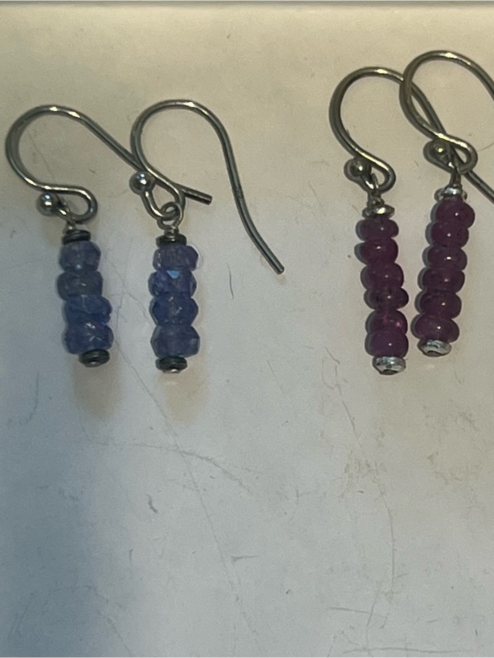 2 sets of earrings, tanzanite and ruby